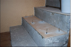 Отделка бетонных и металлических лестниц
